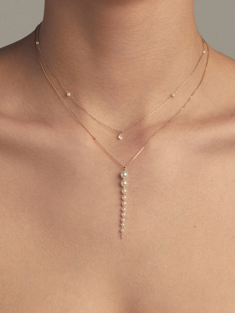 SBN266 Sea of Beauty. Diamond Pear and Floating Spaced Pearl Necklace