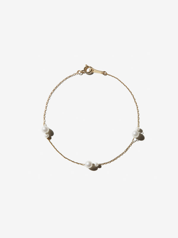 FLOATING PEARL 14-carat gold chain bracelet | Lulu's Collective